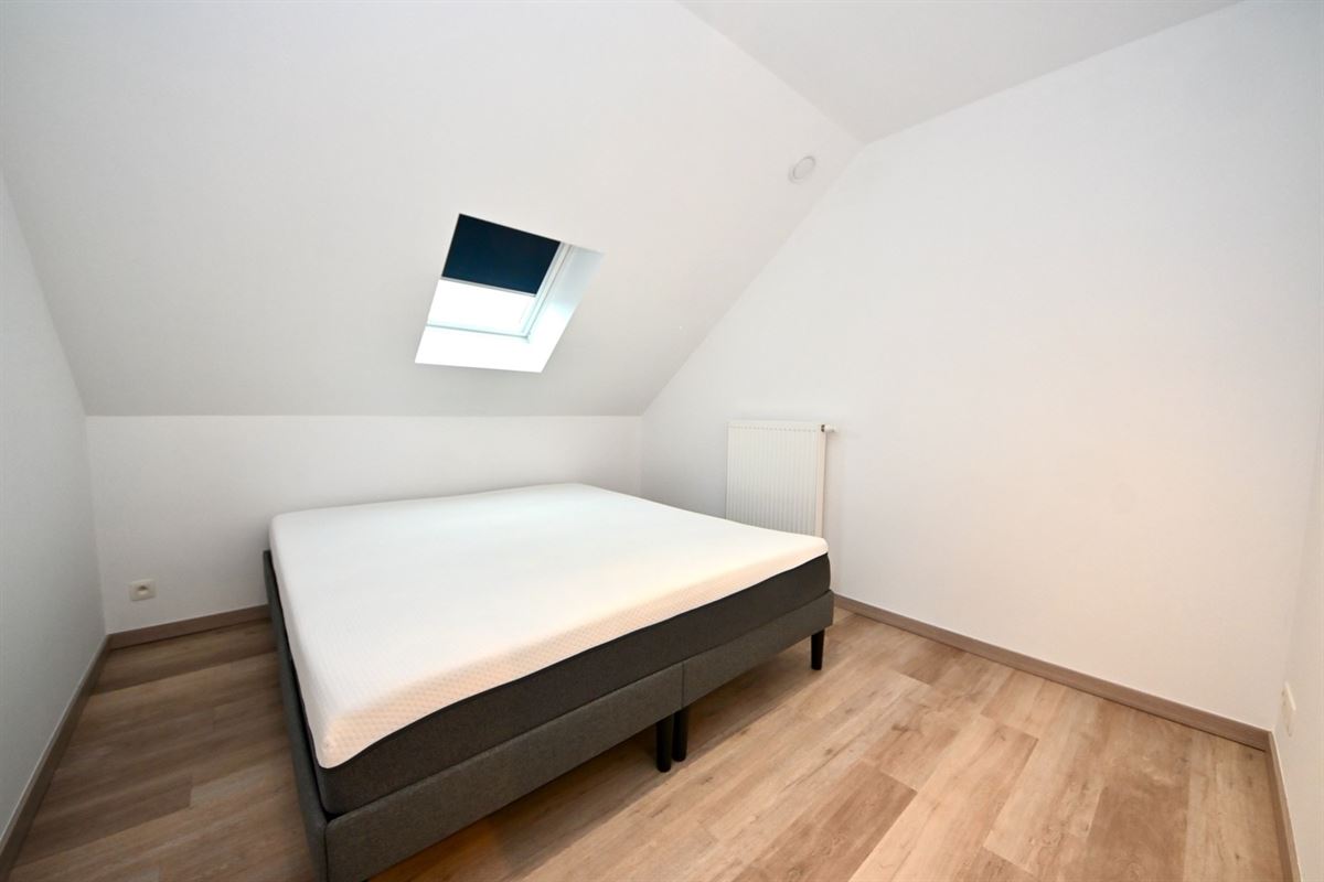 Duplex appartement met 2 slaapkamers en terras.