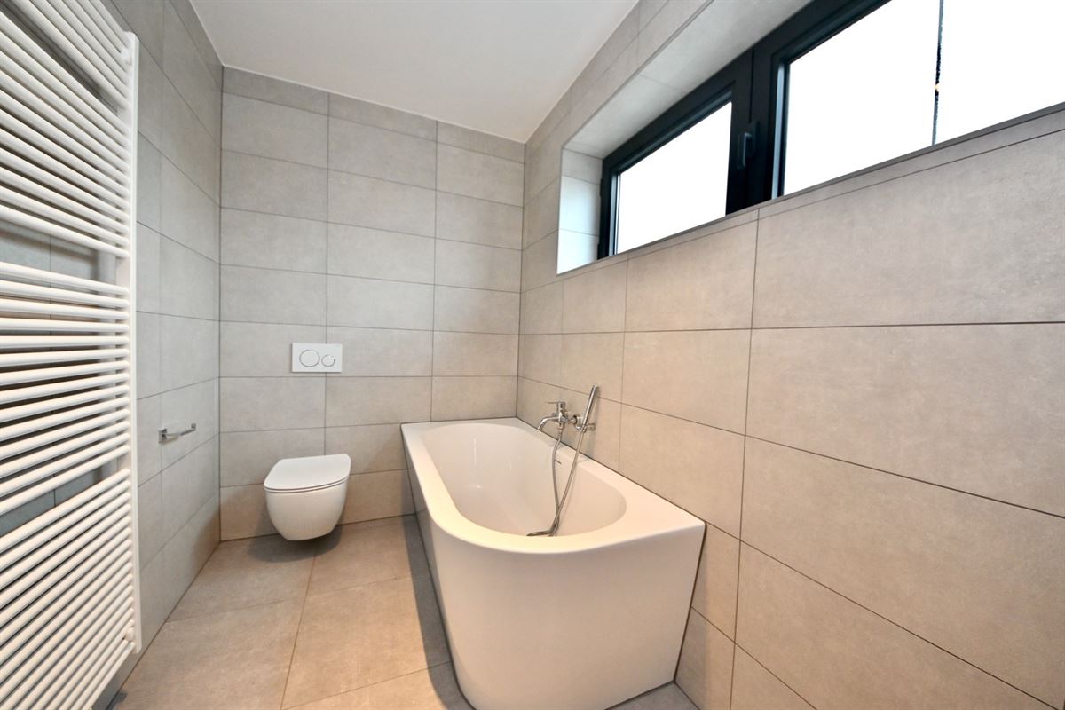 Duplex appartement met 2 slaapkamers en terras.