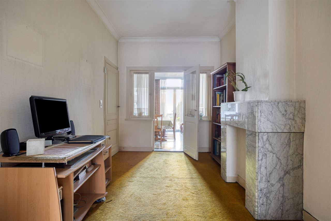 Te renoveren woning met 4 slaapkamers en tuin.
