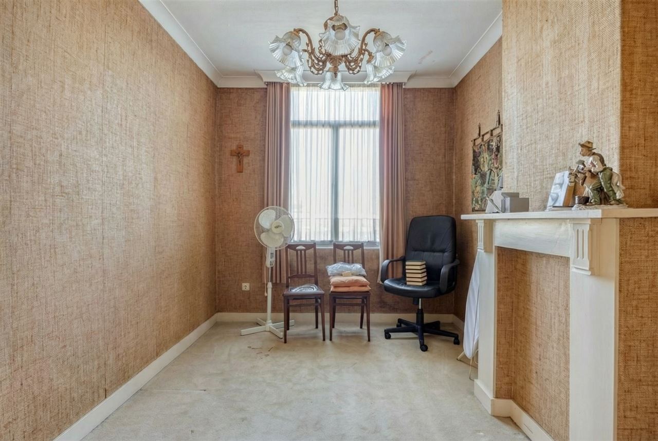 Te renoveren woning met 4 slaapkamers en tuin.