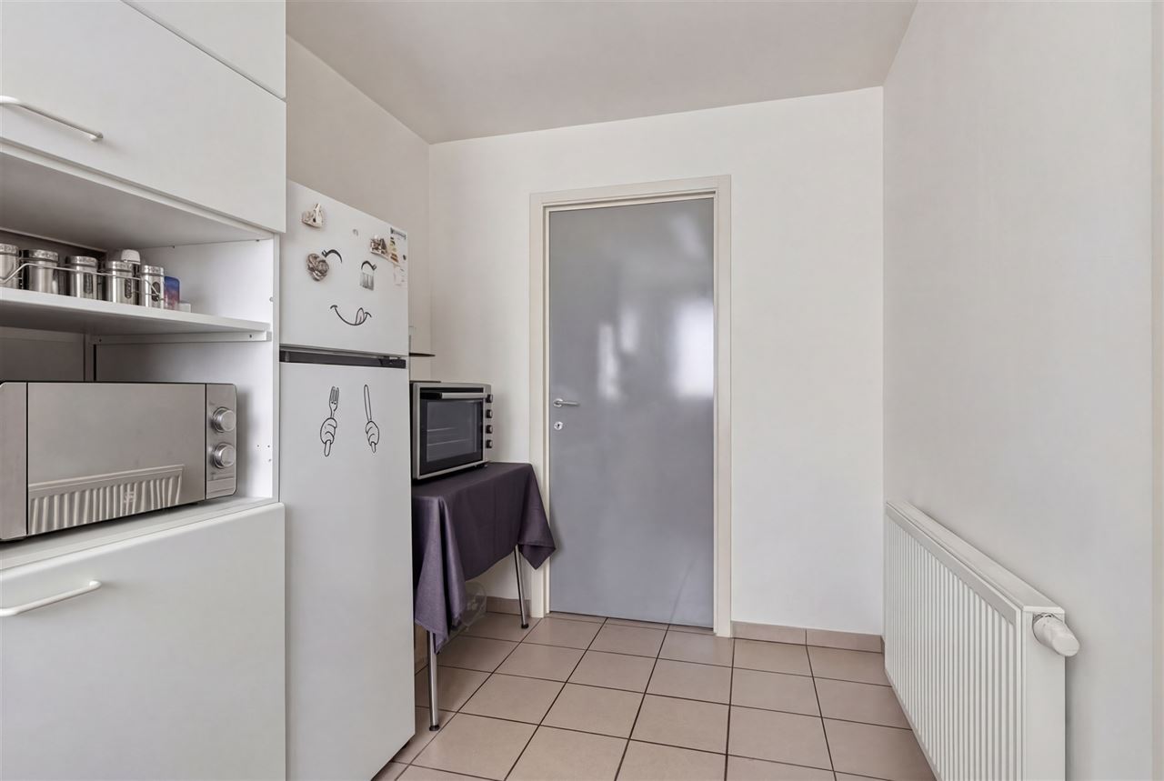Instapklaar app. met 2 slaapkamers, terras en garage.