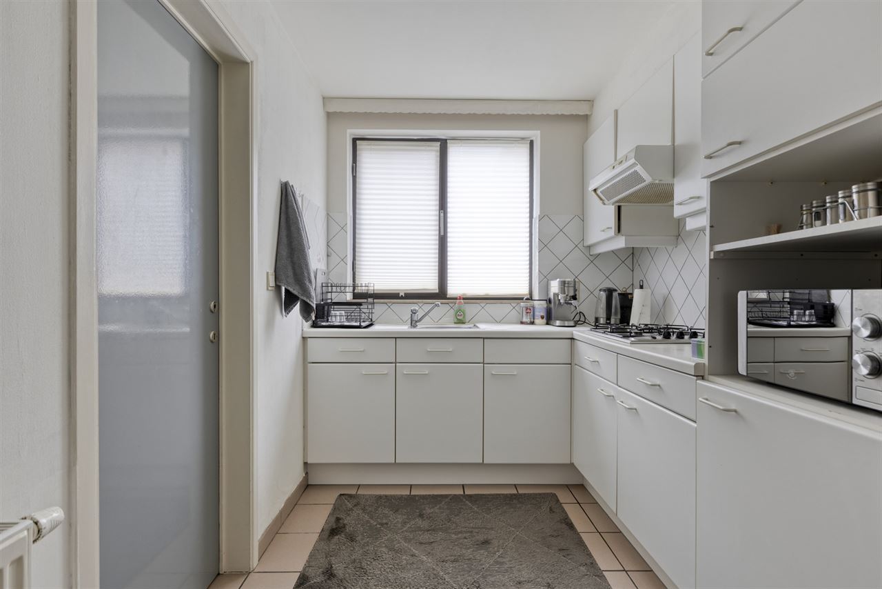 Instapklaar app. met 2 slaapkamers, terras en garage.