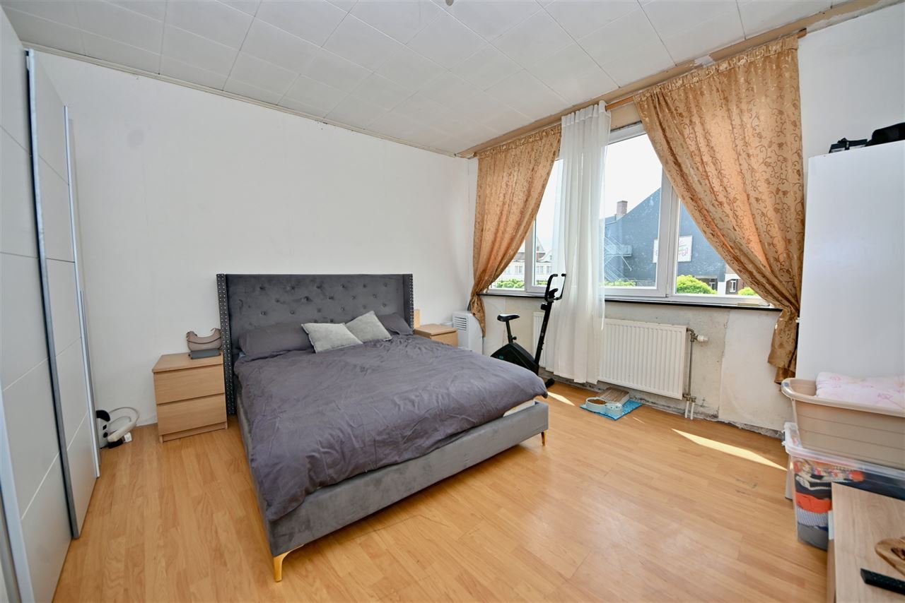 Op te frissen woning met 4 slaapkamers.