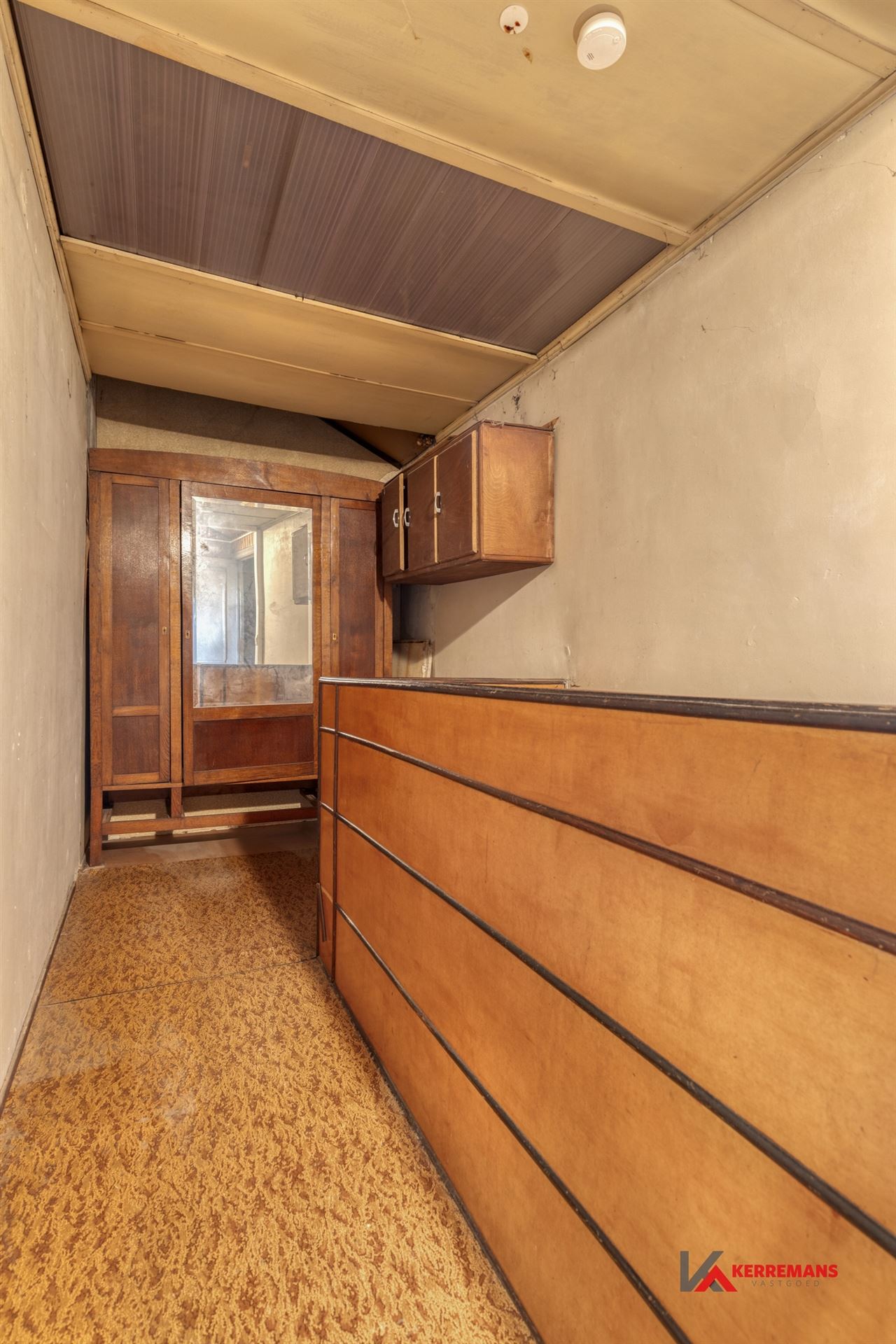 Op te frissen woning met 4 slaapkamers, tuin en garage.