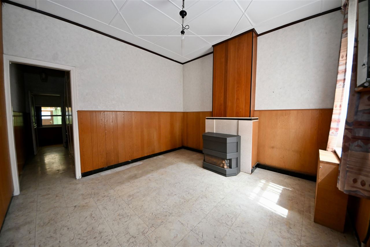 Te renoveren woning met 3 slaapkamers, tuin en garage.