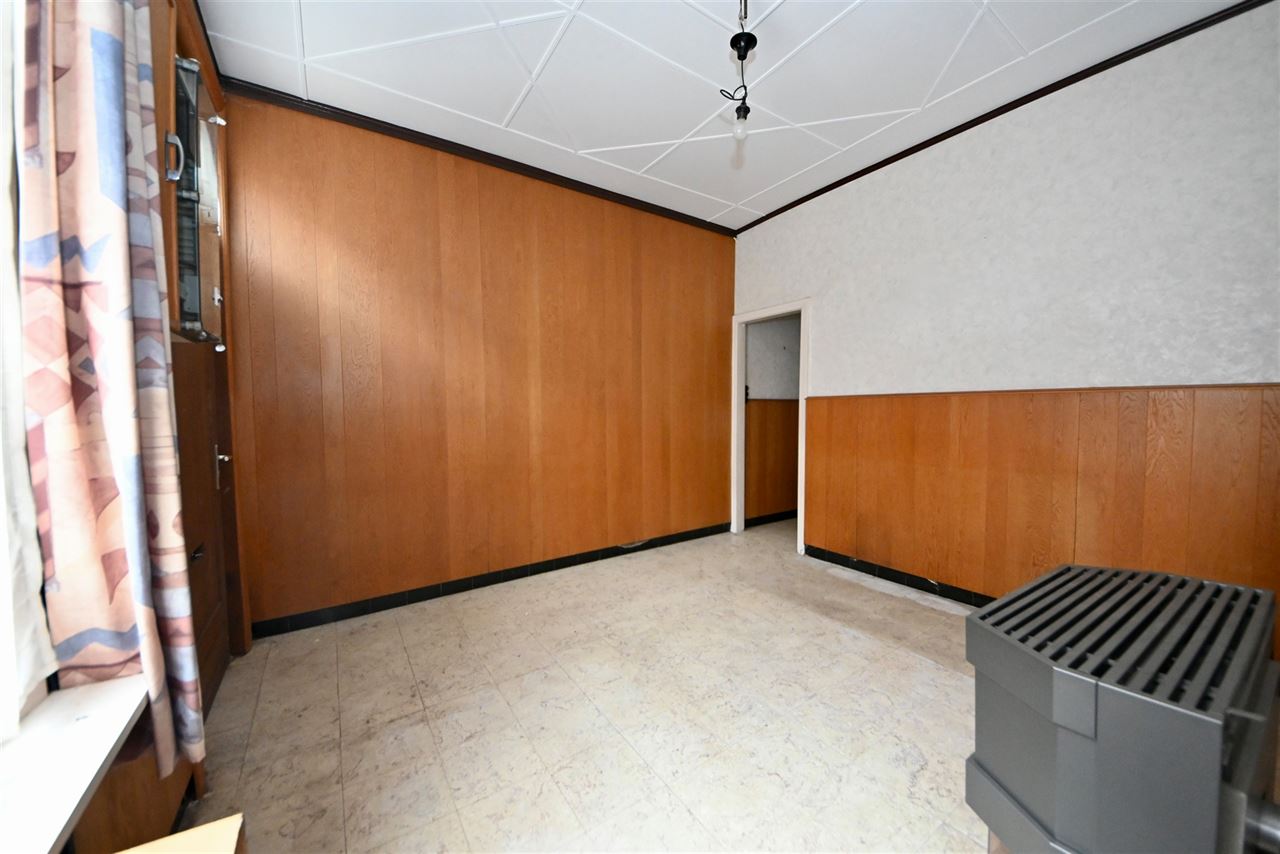 Te renoveren woning met 3 slaapkamers, tuin en garage.