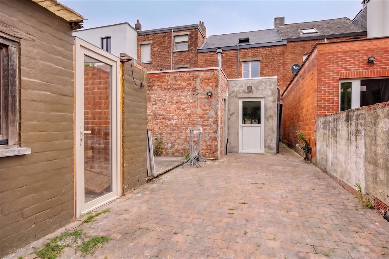 Woning met 4 slaapkamers en tuin.