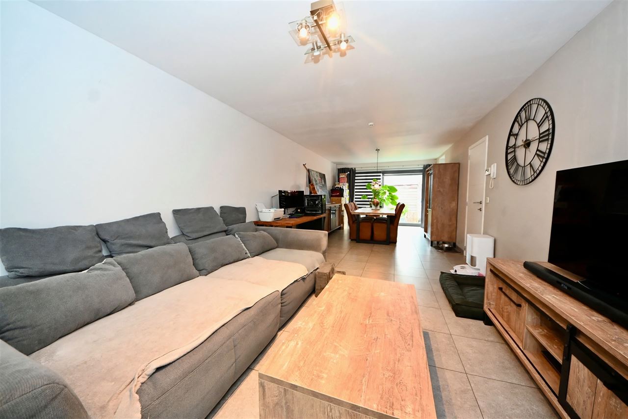 Woning met 4 slaapkamers en garage.