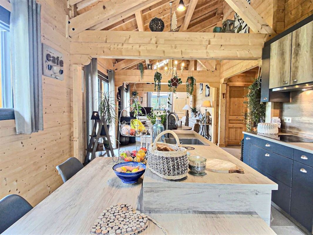 Vivez de plain pied dans un splendide chalet massif sur 26 ares