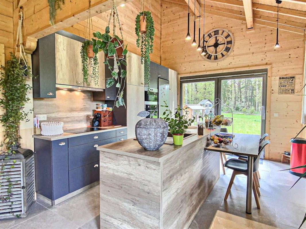 Vivez de plain pied dans un splendide chalet massif sur 26 ares