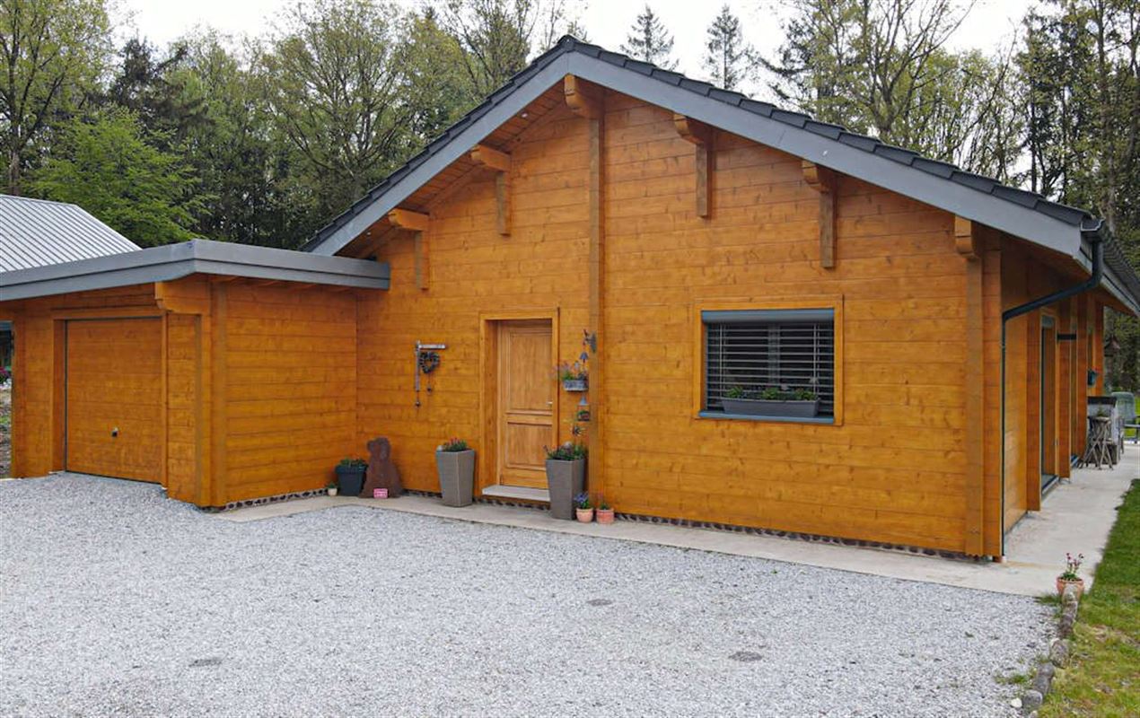 Vivez de plain pied dans un splendide chalet massif sur 26 ares