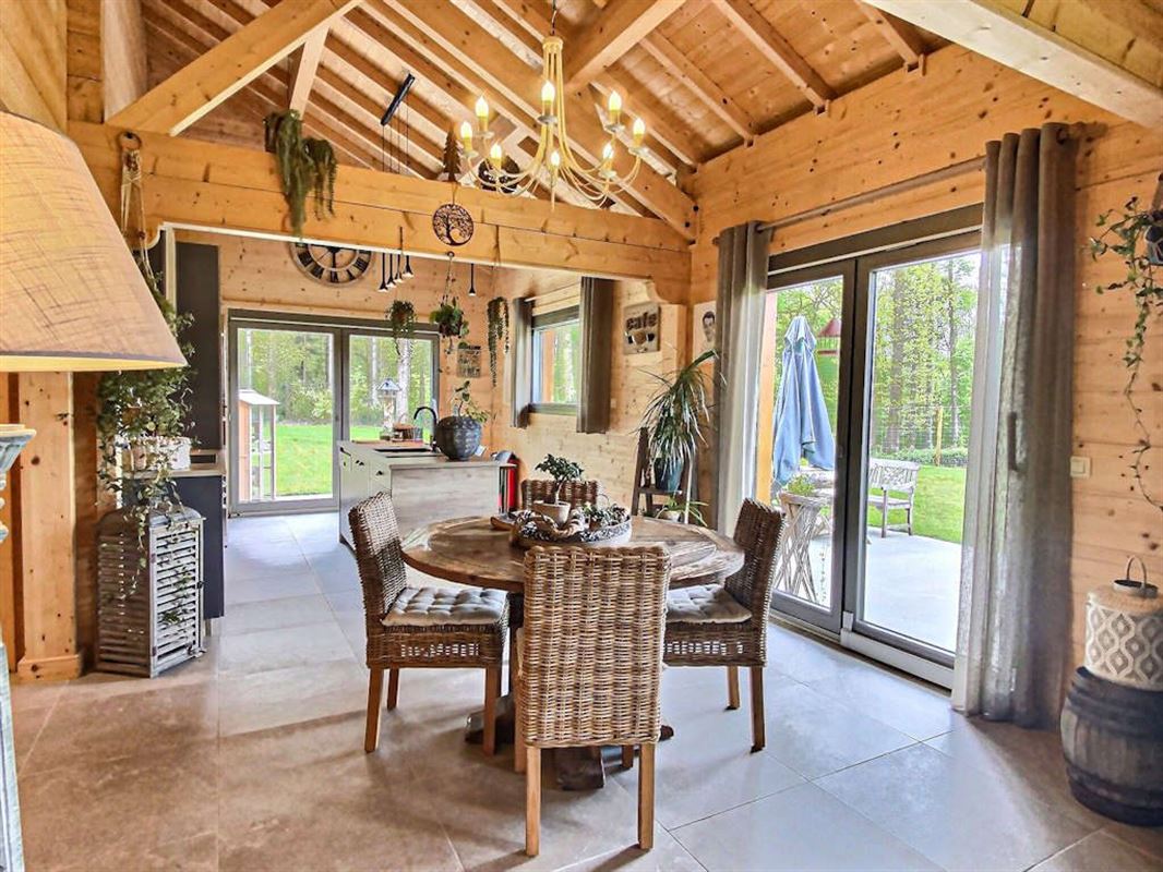 Vivez de plain pied dans un splendide chalet massif sur 26 ares