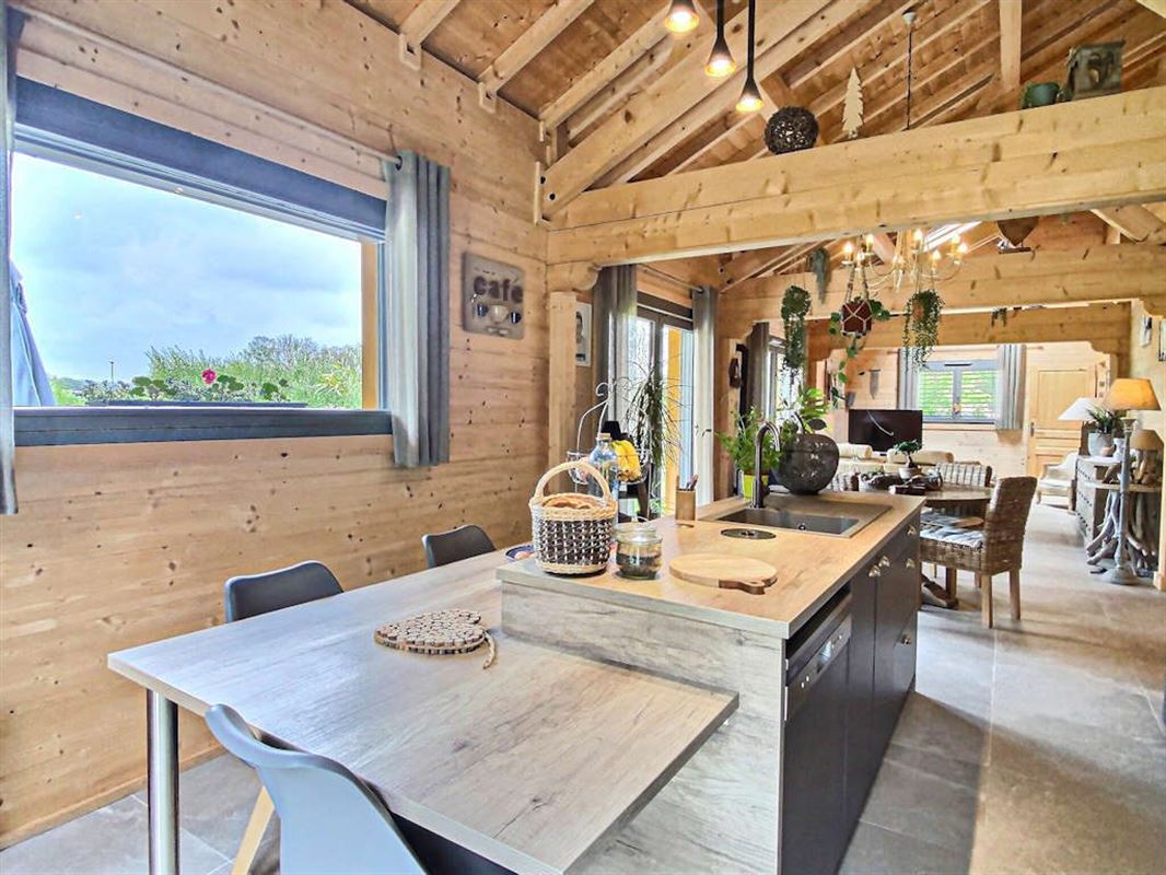 Vivez de plain pied dans un splendide chalet massif sur 26 ares