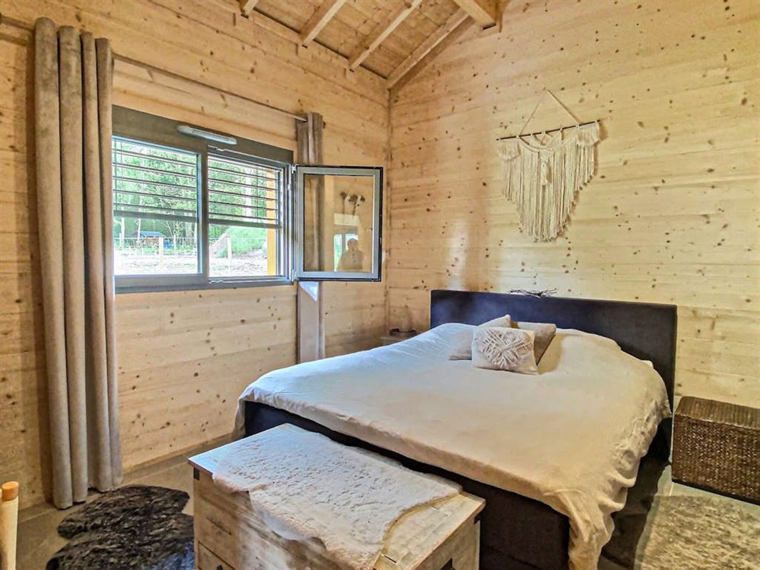 Vivez de plain pied dans un splendide chalet massif sur 26 ares