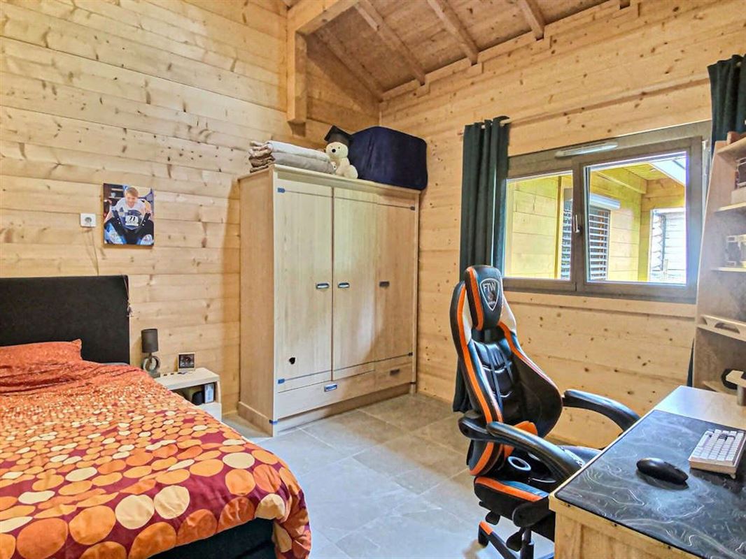 Vivez de plain pied dans un splendide chalet massif sur 26 ares