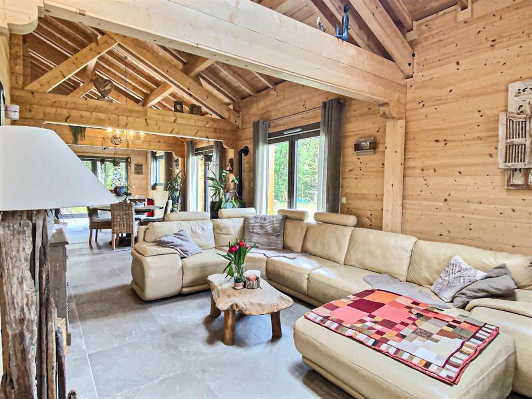 Vivez de plain pied dans un splendide chalet massif sur 26 ares