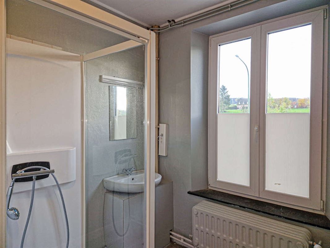 Immeuble commercial en bon état de 511m² sur 18a 25ca