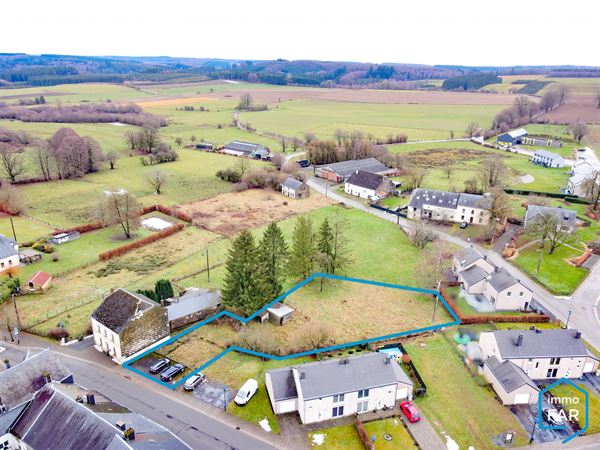 À 5 minutes de l’E411 – Parcelle à bâtir de 15 ares 02ca.