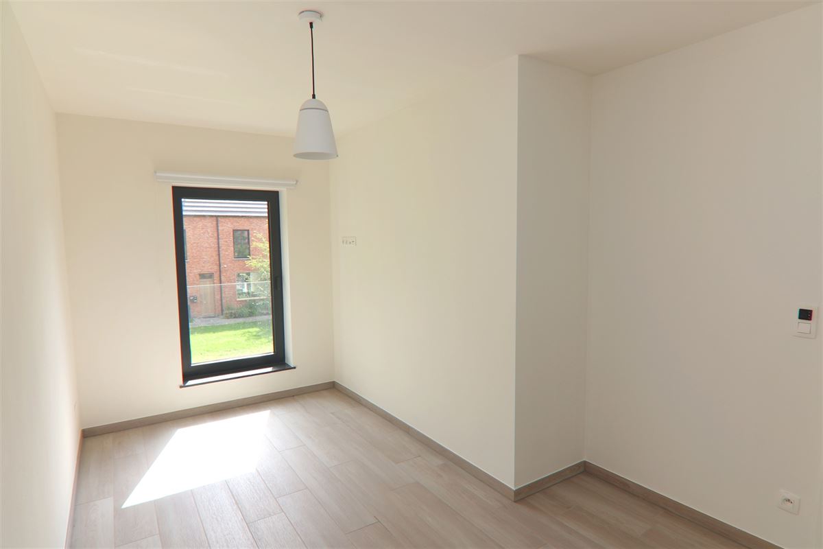 RUSTIG GELEGEN WONING MET 4 SLKS NABIJ HET STADSCENRUM