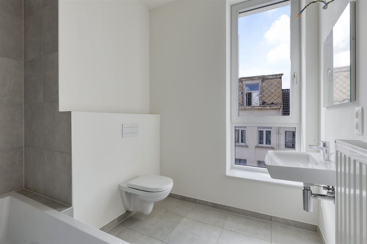 STADSWONING MET 3 SLKS/2BADKS + TERRAS VAN 12M² IN HARTJE ANTWERPEN