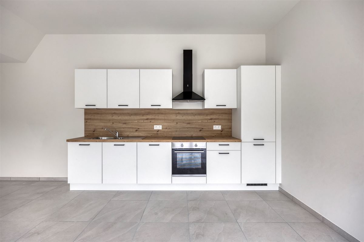 NIEUWBOUWAPP. MET TERRAS IN EEN NIEUWE WOONBUURT