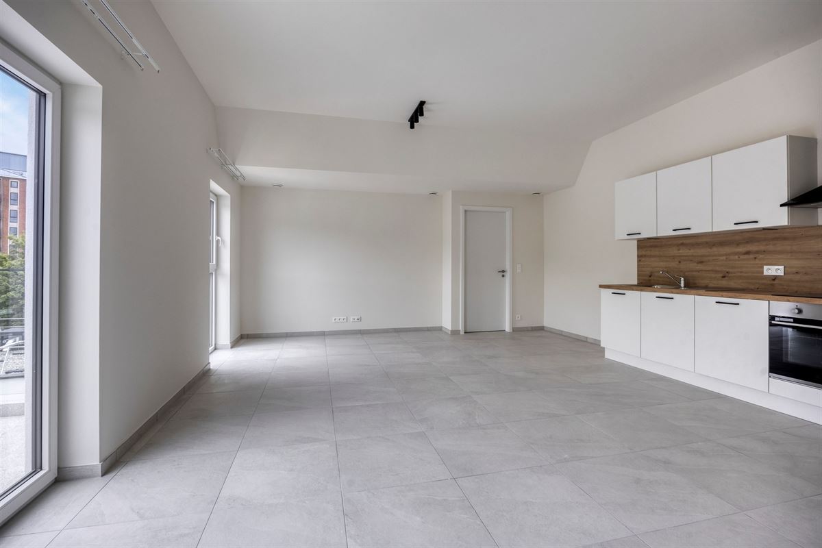 NIEUWBOUWAPP. MET TERRAS IN EEN NIEUWE WOONBUURT