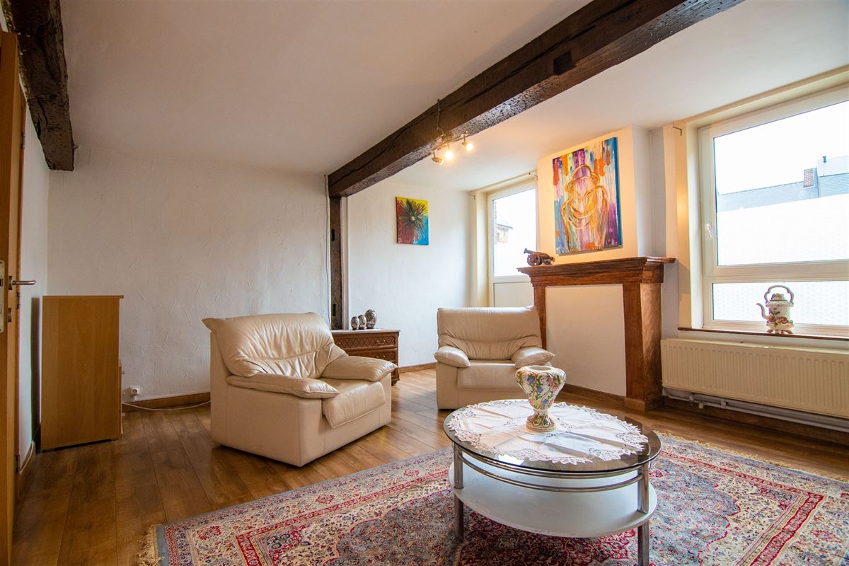 Handelsruimte met appartement in het centrum van Borgloon!