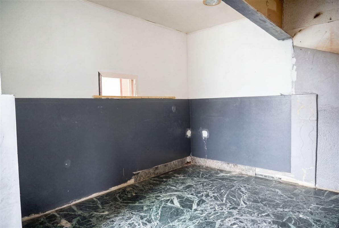 Handelsruimte met appartement in het centrum van Borgloon!
