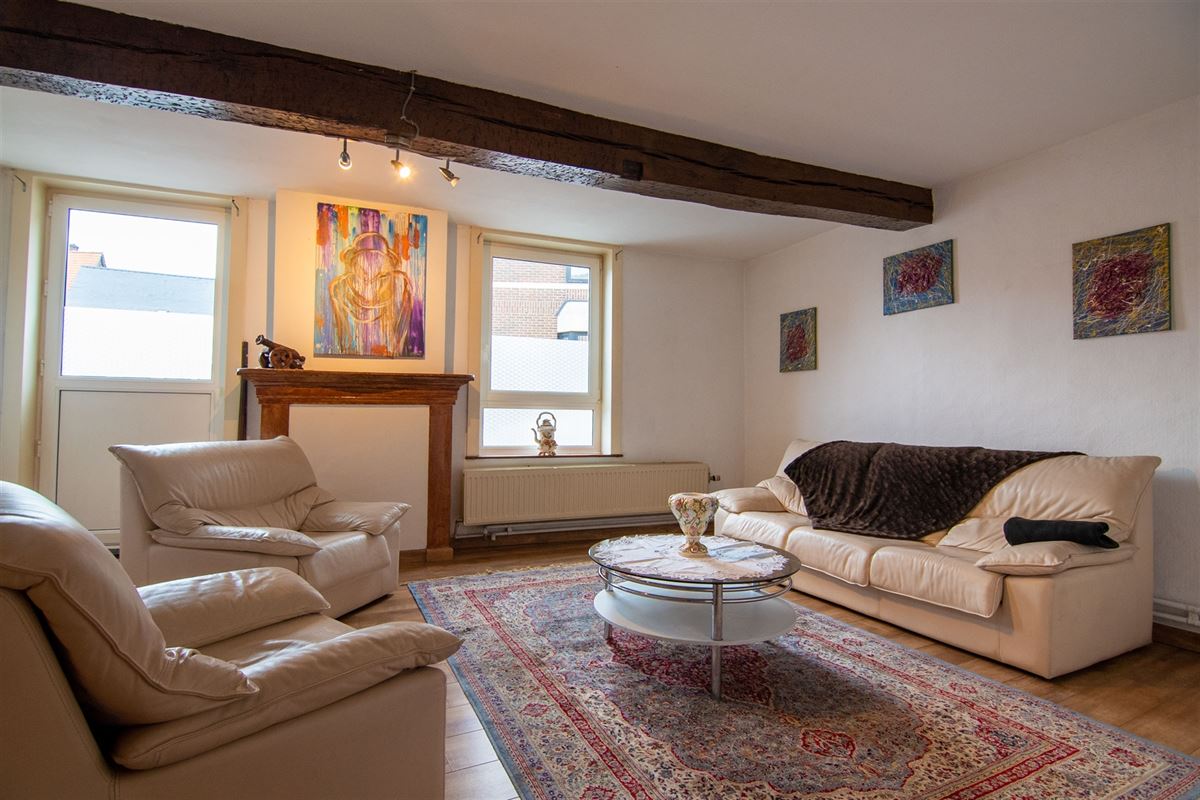 Handelsruimte met appartement in het centrum van Borgloon!