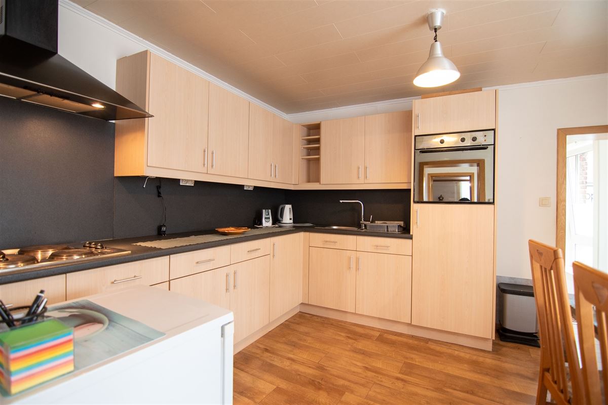Handelsruimte met appartement in het centrum van Borgloon!