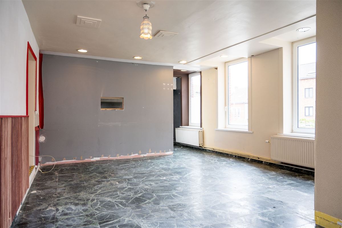 Handelsruimte met appartement in het centrum van Borgloon!