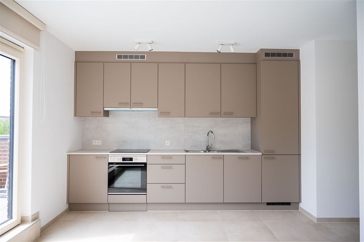 Volledig gerenoveerd dakappartement met twee terrassen in Kuringen.