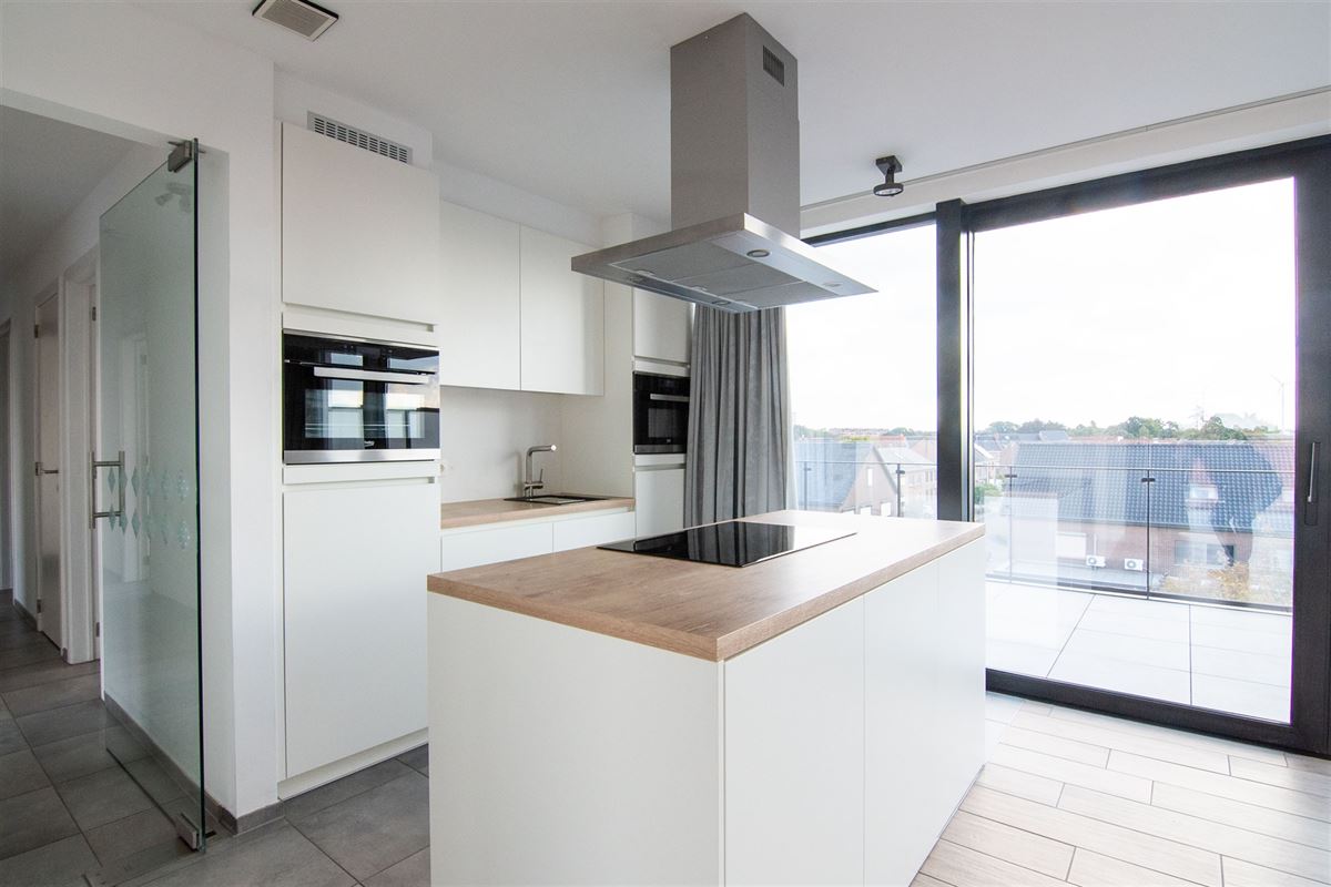 Penthouse met twee bijzonder ruime terrassen en ondergrondse parkeerplaats!