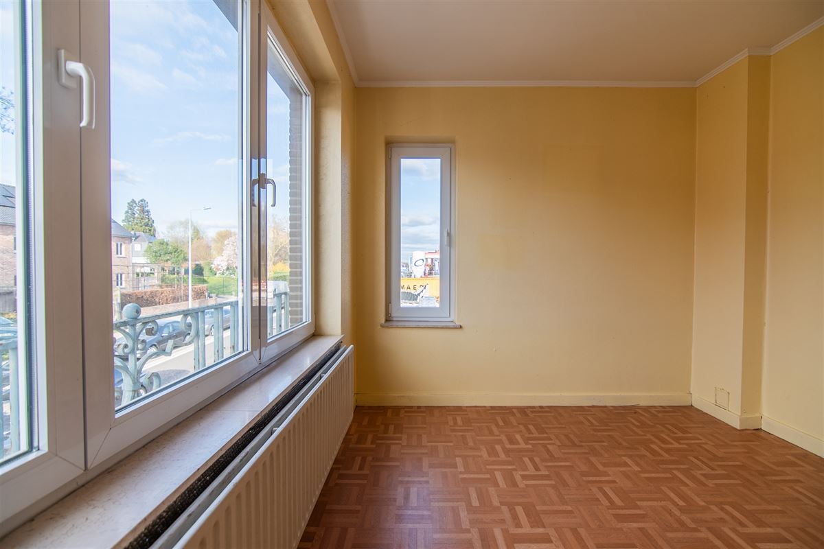Op te frissen woning met 7 slaapkamers en ruime tuin aan het centrum van Tongeren.