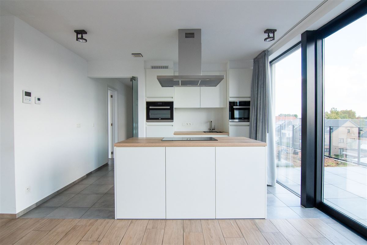 Penthouse met twee bijzonder ruime terrassen en ondergrondse parkeerplaats!