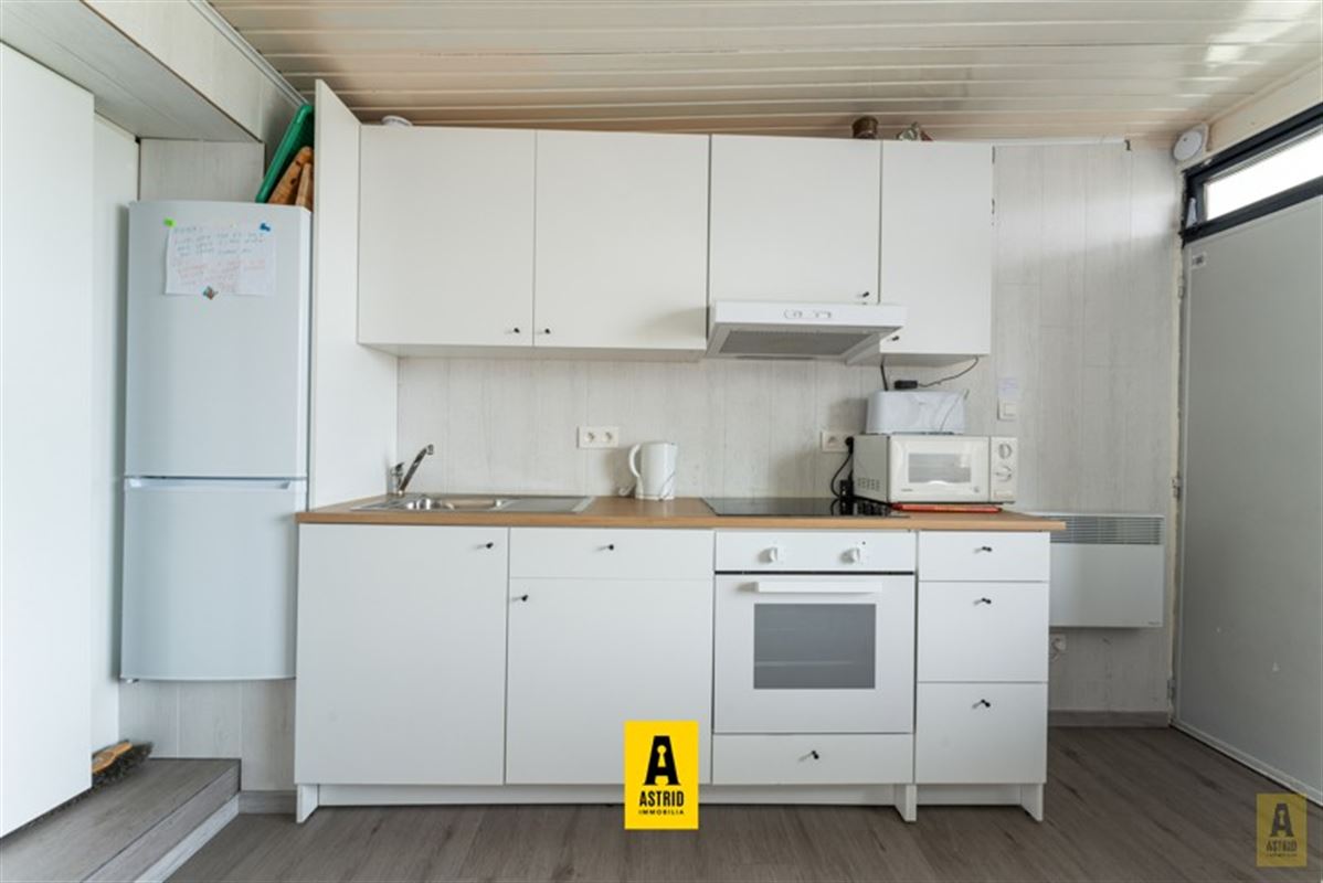 Gezellig vakantie-appartement in groen domein vlakbij zee!