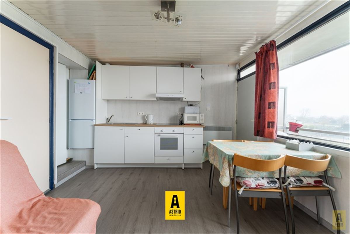 Gezellig vakantie-appartement in groen domein vlakbij zee!