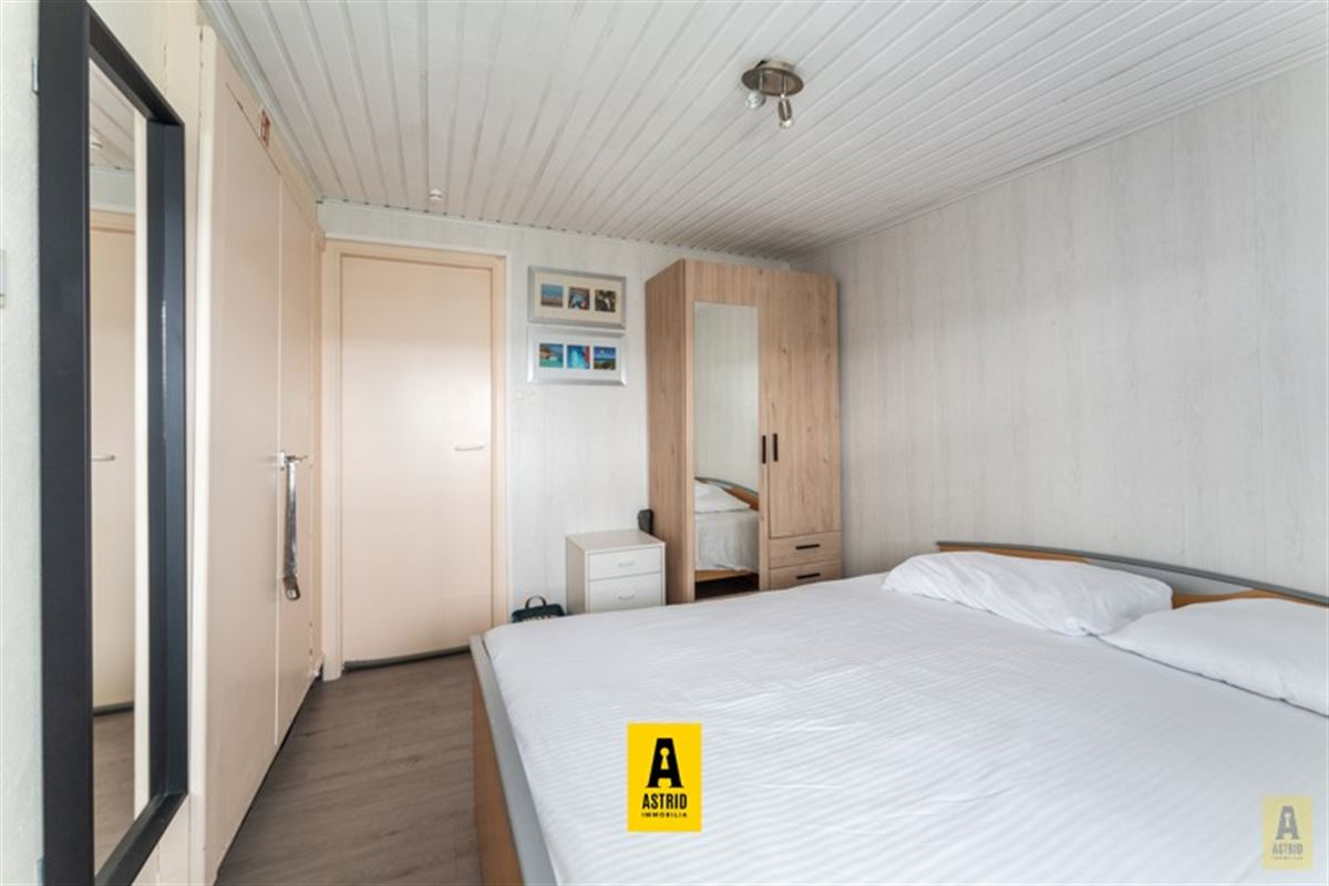 Gezellig vakantie-appartement in groen domein vlakbij zee!
