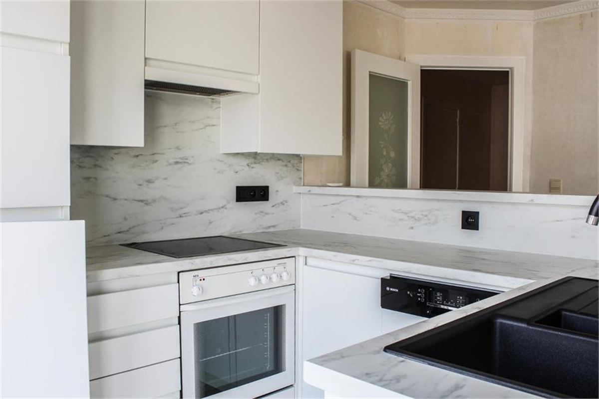 Zonnig en instapklaar hoekappartement vlakbij strand en winkels!