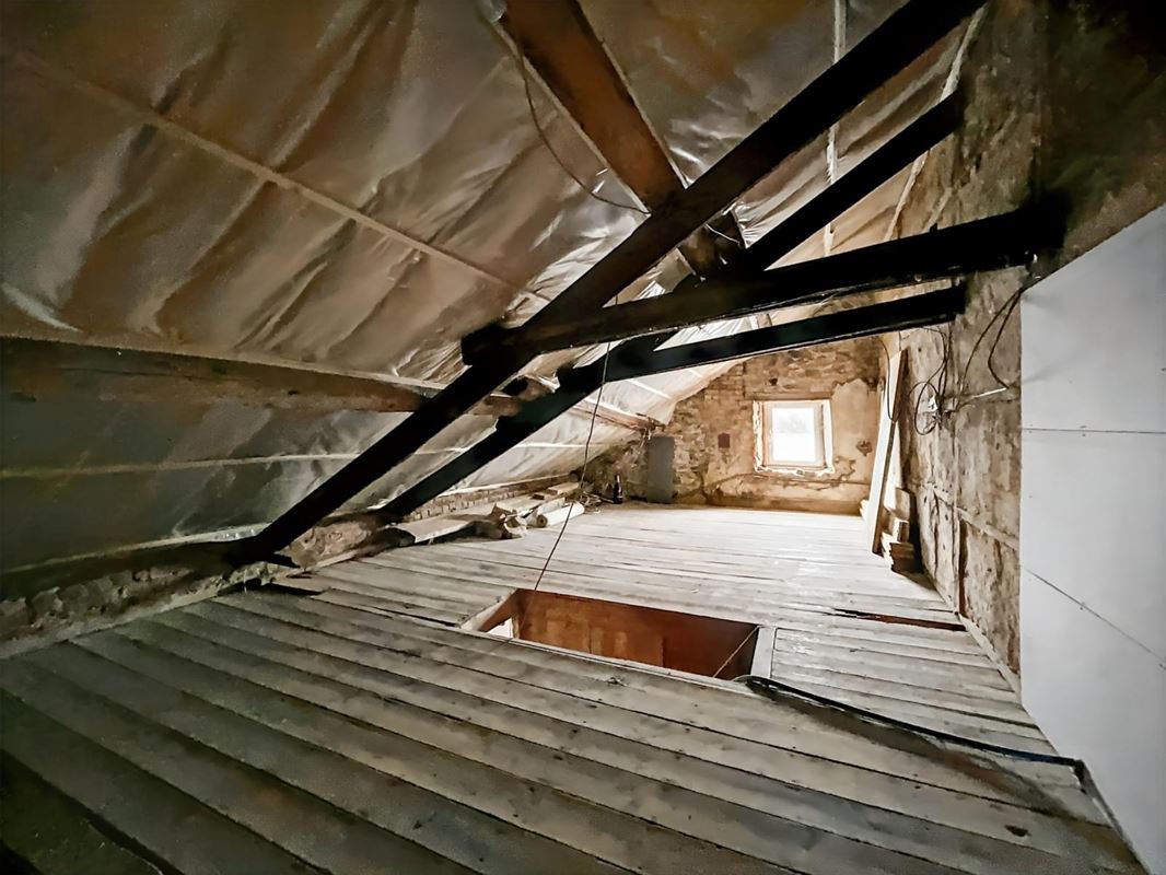 Dorpshuis met tuin en twee onafhankelijke woningen te Champlon