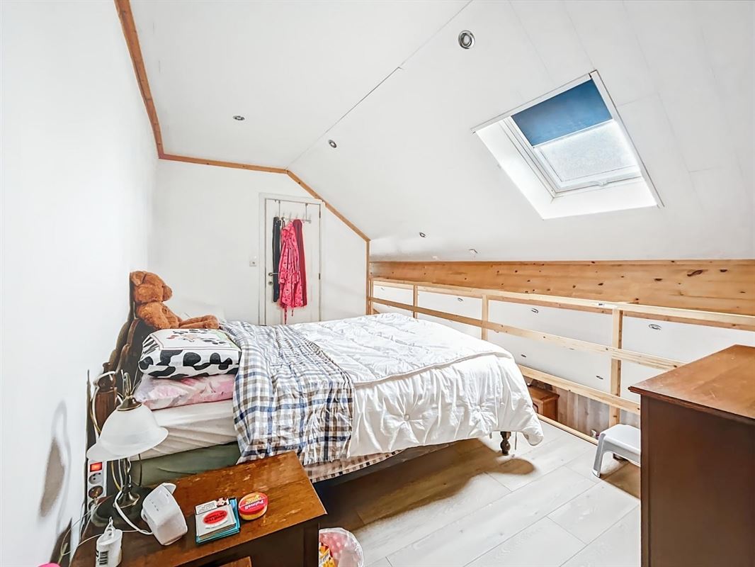 Dorpshuis met tuin en twee onafhankelijke woningen te Champlon