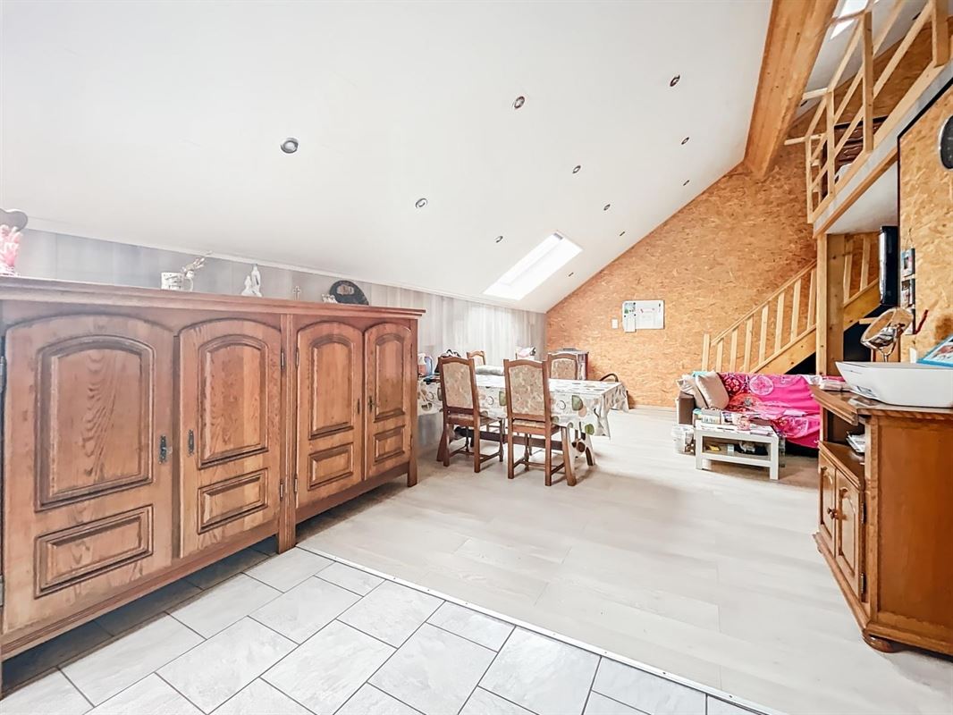 Dorpshuis met tuin en twee onafhankelijke woningen te Champlon