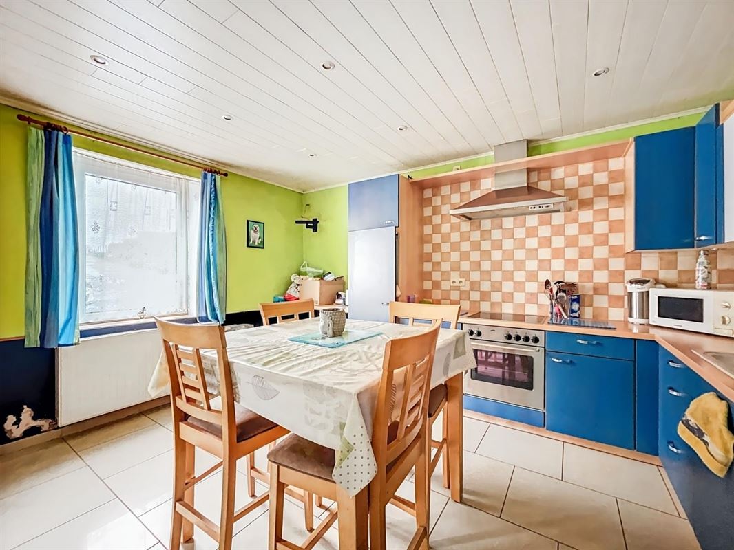 Dorpshuis met tuin en twee onafhankelijke woningen te Champlon