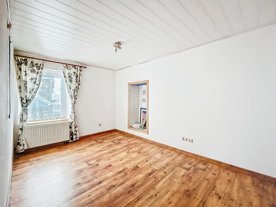 Dorpshuis met tuin en twee onafhankelijke woningen te Champlon