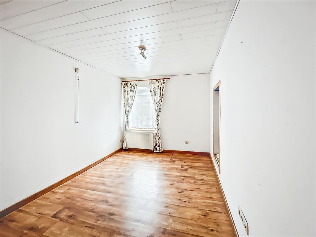 Dorpshuis met tuin en twee onafhankelijke woningen te Champlon