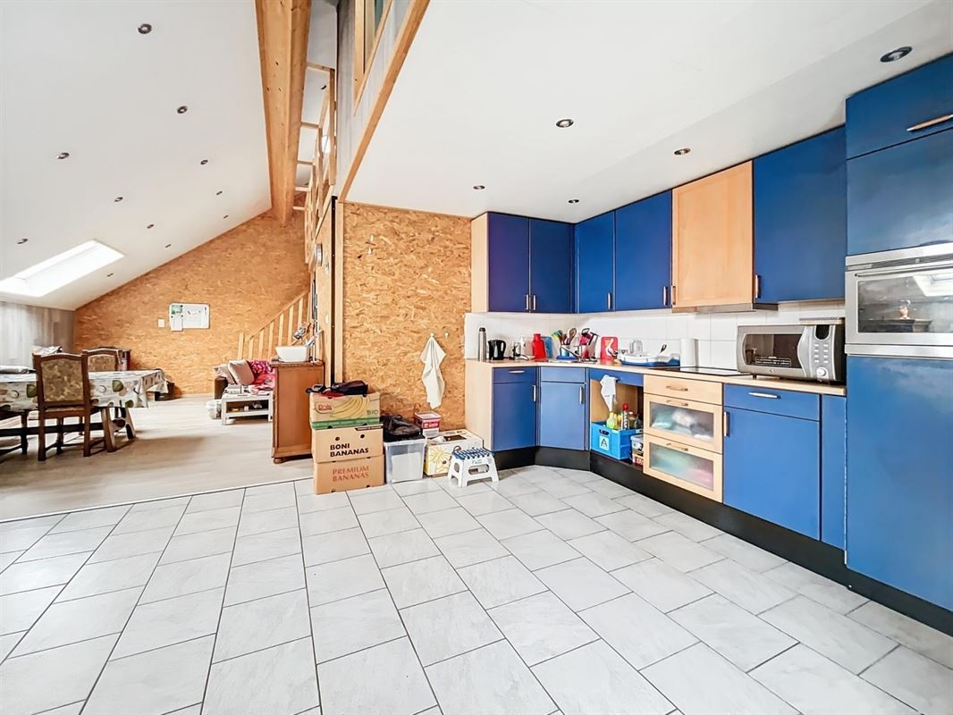 Dorpshuis met tuin en twee onafhankelijke woningen te Champlon