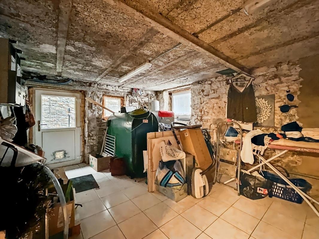Dorpshuis met tuin en twee onafhankelijke woningen te Champlon