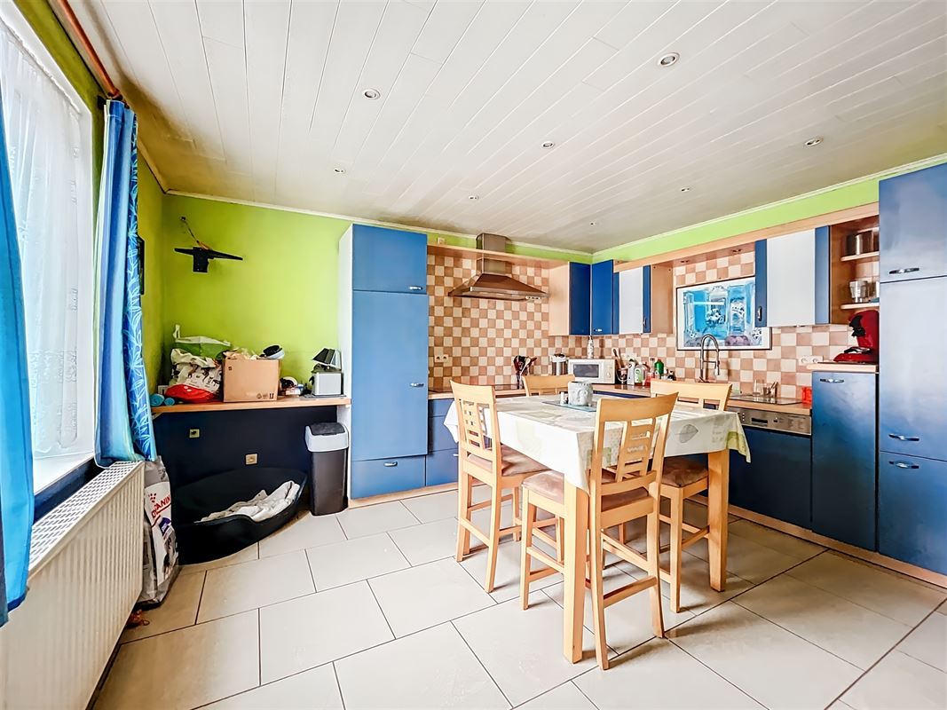 Dorpshuis met tuin en twee onafhankelijke woningen te Champlon