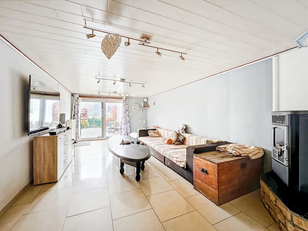Dorpshuis met tuin en twee onafhankelijke woningen te Champlon