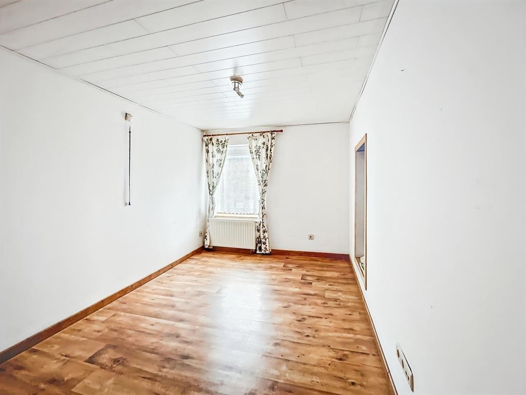Dorpshuis met tuin en twee onafhankelijke woningen te Champlon